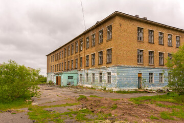 An old abandoned school in the ghost town of Sovetsky. Vorkuta, Russia.
