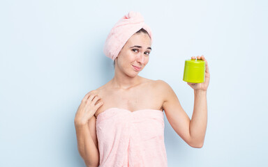 young pretty woman looking arrogant, successful, positive and proud. shower and hair product concept