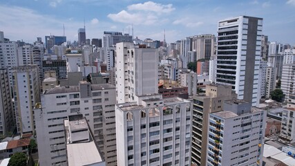 Fototapeta na wymiar Aerial view of Jardins district in São Paulo, Brazil. Residential and commercial buildings in a prime area with Av. Paulista on background