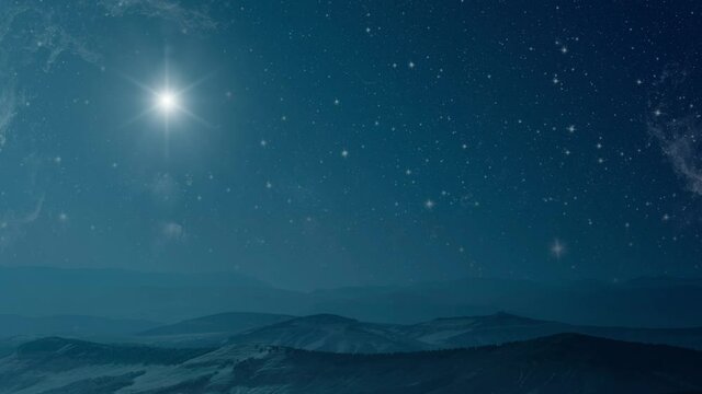 The star shines over the manger of christmas of Jesus Christ.	