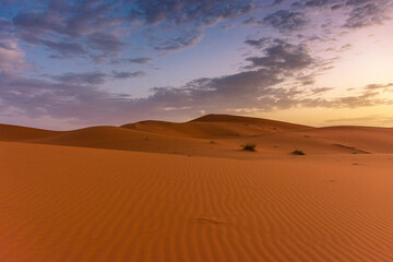 Obraz na płótnie Canvas Dawn in the dunes of the Erg Chebbi, Sahara Desert, Morocco