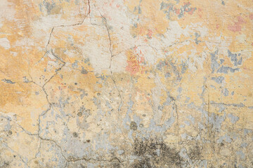 Alte raue orangefarbene Putzwandoberfläche Künstlerisch. Wände und Hintergrund, gelbe Betonoberfläche