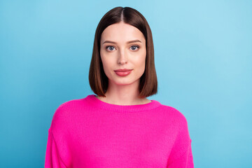 Photo of adorable shiny young lady wear pink pullover smiling isolated blue color background