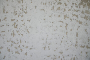 Texture of the old stucco wall. Cracked stucco wall background	