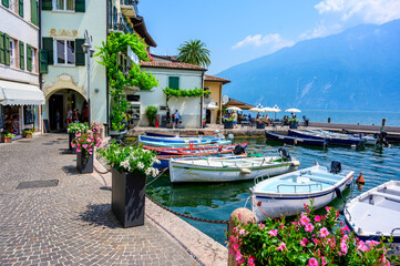 Limone sul Garda - harbour village at Lake Garda with beautiful mountain scenery, Italy - travel destination - 468773229