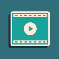 Green Online play video icon isolated on green background. Film strip with play sign. Long shadow style. Vector