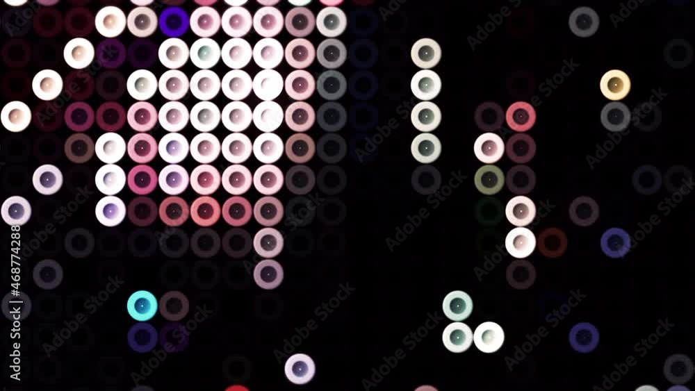 Poster old school pixels animation flickering on black background. motion. colorful running circle snakes, 