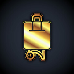 Gold Suitcase for travel icon isolated on black background. Traveling baggage sign. Travel luggage icon. Vector