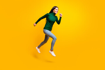 Fototapeta na wymiar Full size profile side photo of cute nice cheerful lady jump up run empty space sale isolated on yellow color background