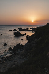 Fototapeta premium Silhouette of the rocky coast during the sunset on Crete