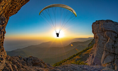 paraglider pilot fly in sky on beauty nature mountain landscape