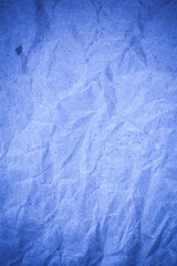 Recycling blue paper crumpled background.