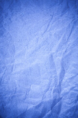 Recycling blue paper crumpled background.