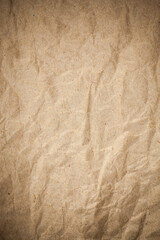 Textured crumpled packaging brown paper background.
