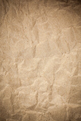 Textured crumpled packaging brown paper background.