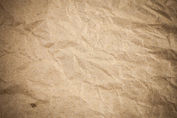 Textured crumpled packaging brown paper background.