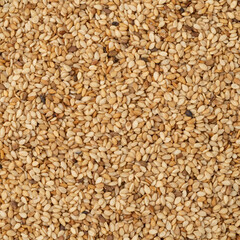Top view, closeup of sesame seeds. Food backdrop