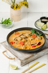 Thai style coconut milk soup with chicken. Tom Kha Gai