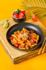 Korean rice cake in spicy Korean sauce with cheese, Cheese Tokpokki, Tteokbokki with Cheese -...