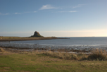 Lindisfarne castle and bay in autumn sunshine