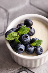 Sweet dessert vanilla panna cotta with blueberries