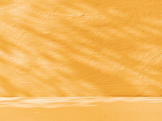 Yellow blank surface with natural shadows
