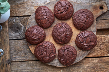 chocolate cookies on wooden background