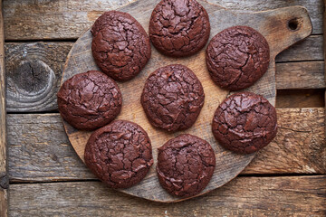 chocolate cookies on wooden background