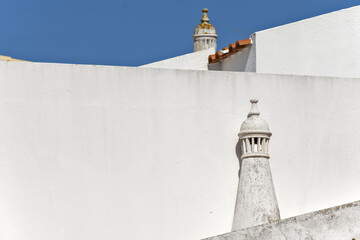 Close view of a traditional algarvian chimney on the city of Estoi in Faro district, Algarve,...