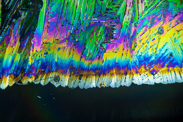 Colorful crystals under microscope, polarization colors, polar filters