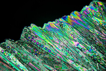 Colorful crystals under microscope, polarization colors, polar filters