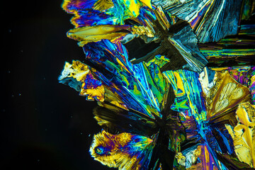 Colorful crystals under microscope, polarization colors, polar filters