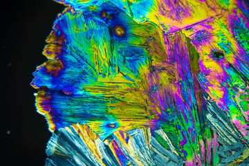 Colorful crystals under microscope, polarization colors, polar filters