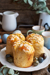 Easter cake with almond chips. Wooden background, side view
