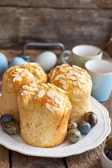 Easter cake with almond chips. Wooden background, side view
