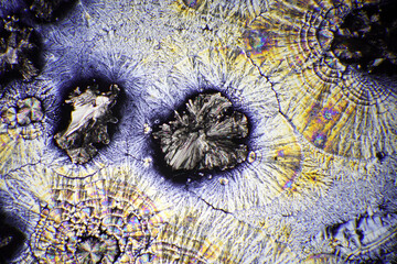 Colorful crystals under microscope, polarization colors, polar filters