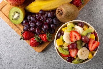 Fruit salad in bowl on the table.