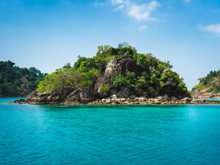 Ko Rang Island. Scenic rocky island, clear turquoise seawater and coral reef. Beautiful snorkeling spot in Mu Koh Chang National Park, Trat, Thailand.
