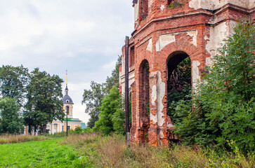Fototapeta na wymiar Ruins of Potemkin's palace and Trinity Church. Manor of Gostilitsa. The village of Gostilitsy. Lomonosov district. Leningrad region. Russia