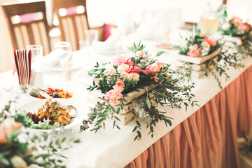 Interior of a restaurant prepared for wedding ceremony