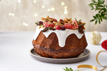Christmas fruit cake with christmas decor. Copy space.Christmas atmosphere.
