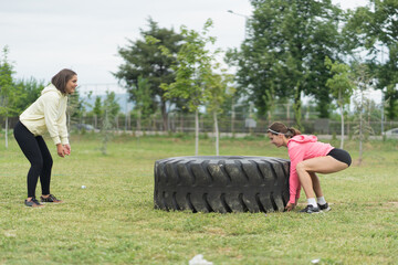 Trying to lift the bulldozewr tire