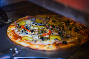 close up view of the italian home made pizza dish
