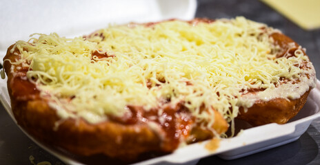 close up view of the italian home made pizza dish