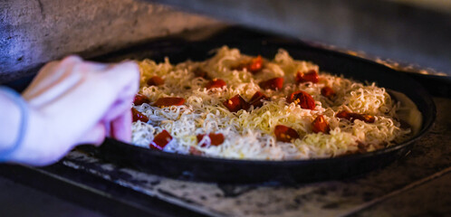 close up view of the italian home made pizza dish
