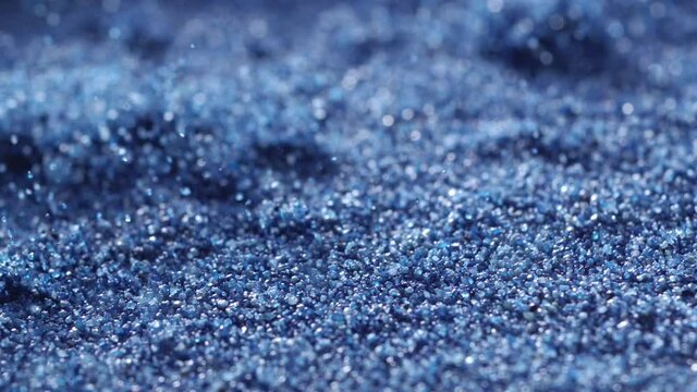 sand exploding in slow motion