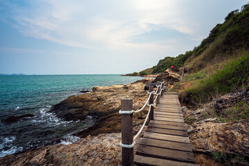 Obraz premium Wood bridge in to the sea