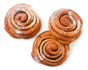 Buns with cinnamon on white background, isolated. The view from top