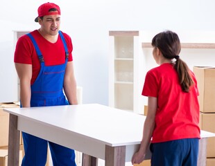 Professional movers doing home relocation