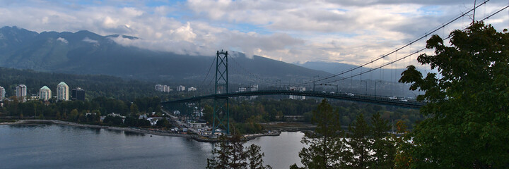 Beautiful panoramic view of Lions Gate Bridge, spanning Burrard Inlet, viewed from Prospect Point in Stanley Park, Vancouver, British Columbia, Canada.